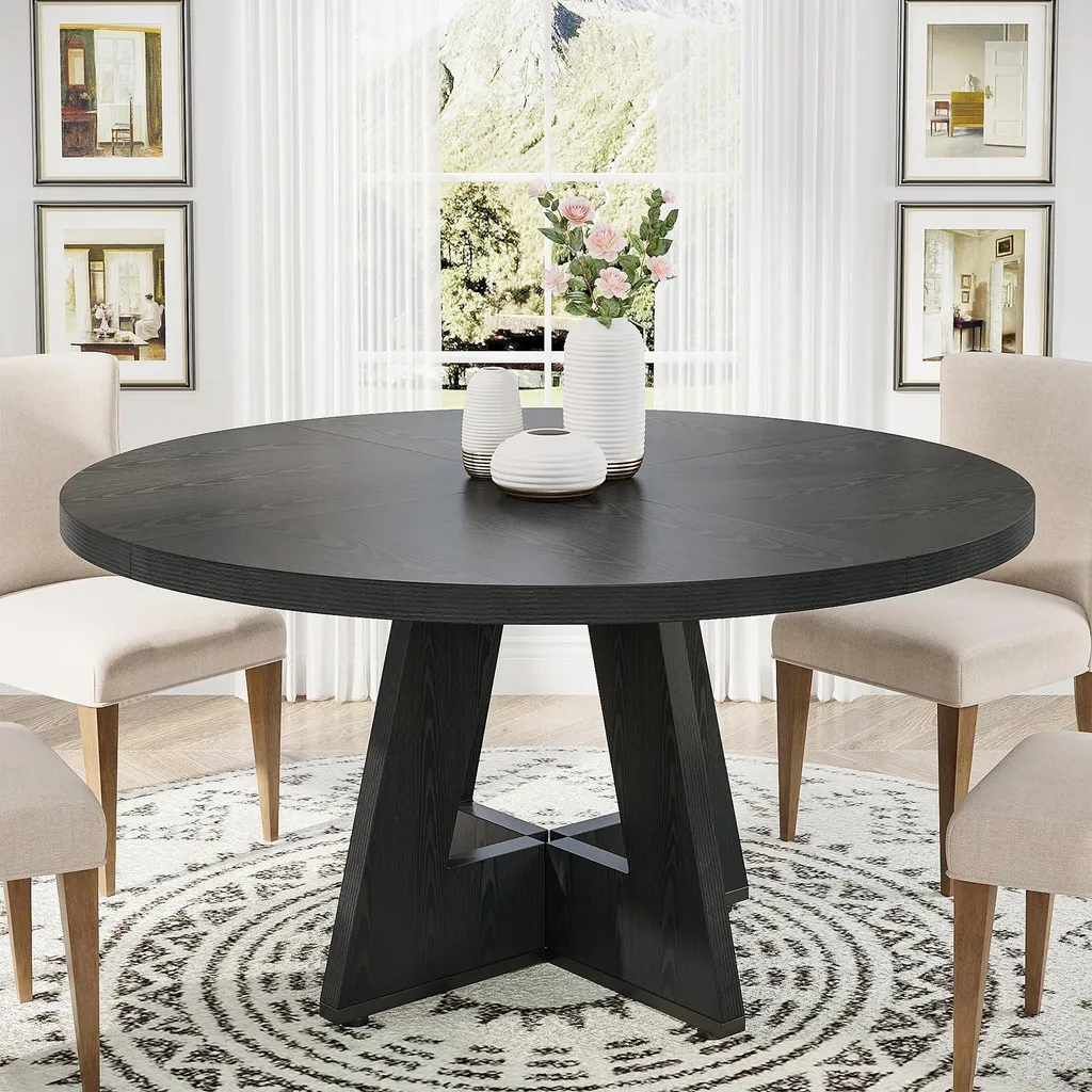 Table à manger ronde 120 cm pour recevoir 8 invités dans un salon noir
