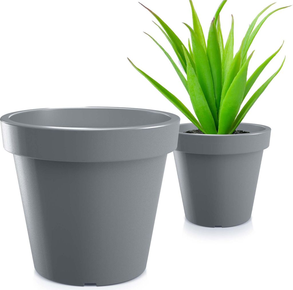 Two gray plant pots on a white background, one with a green plant.