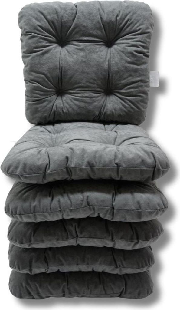 A stack of gray chair cushions.