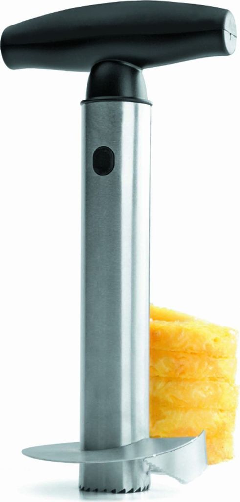 A pineapple corer tool with a stack of pineapple rings.