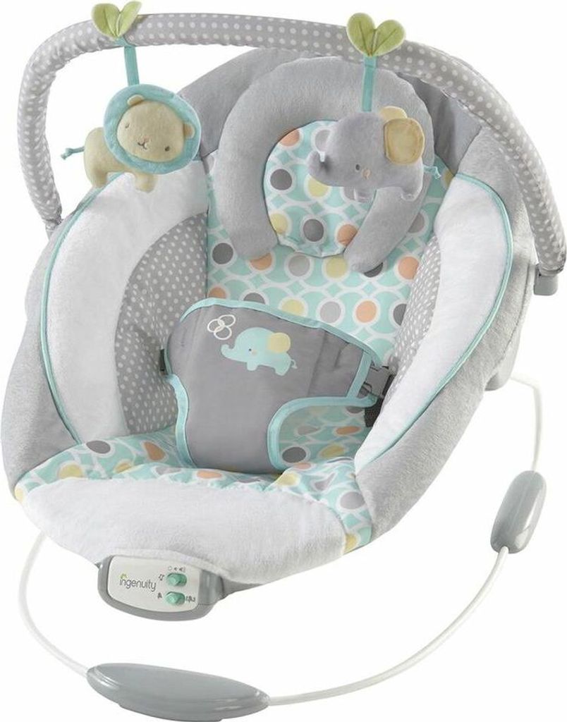 A baby bouncer seat with toys.