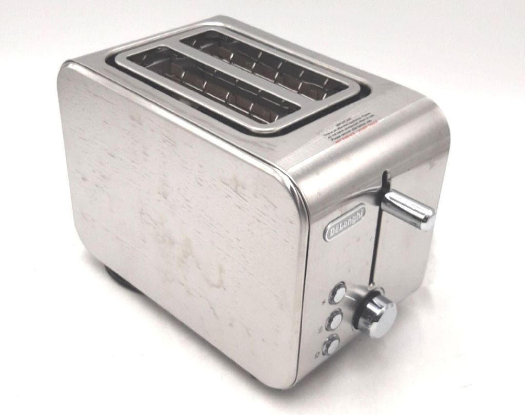 A stainless steel toaster on a white background.