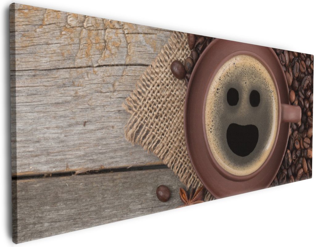 Wallario Premium Leinwandbild Lustige Kaffeetasse mit einem Lächeln - Kaffeebohnen und Zimt in Größe 50 x 125 cm