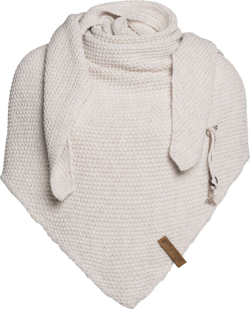 A knitted scarf laid out flat against a white background.