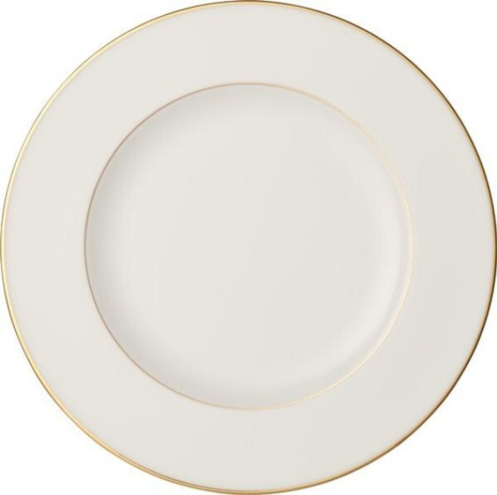 A white plate with a gold rim on a white background.