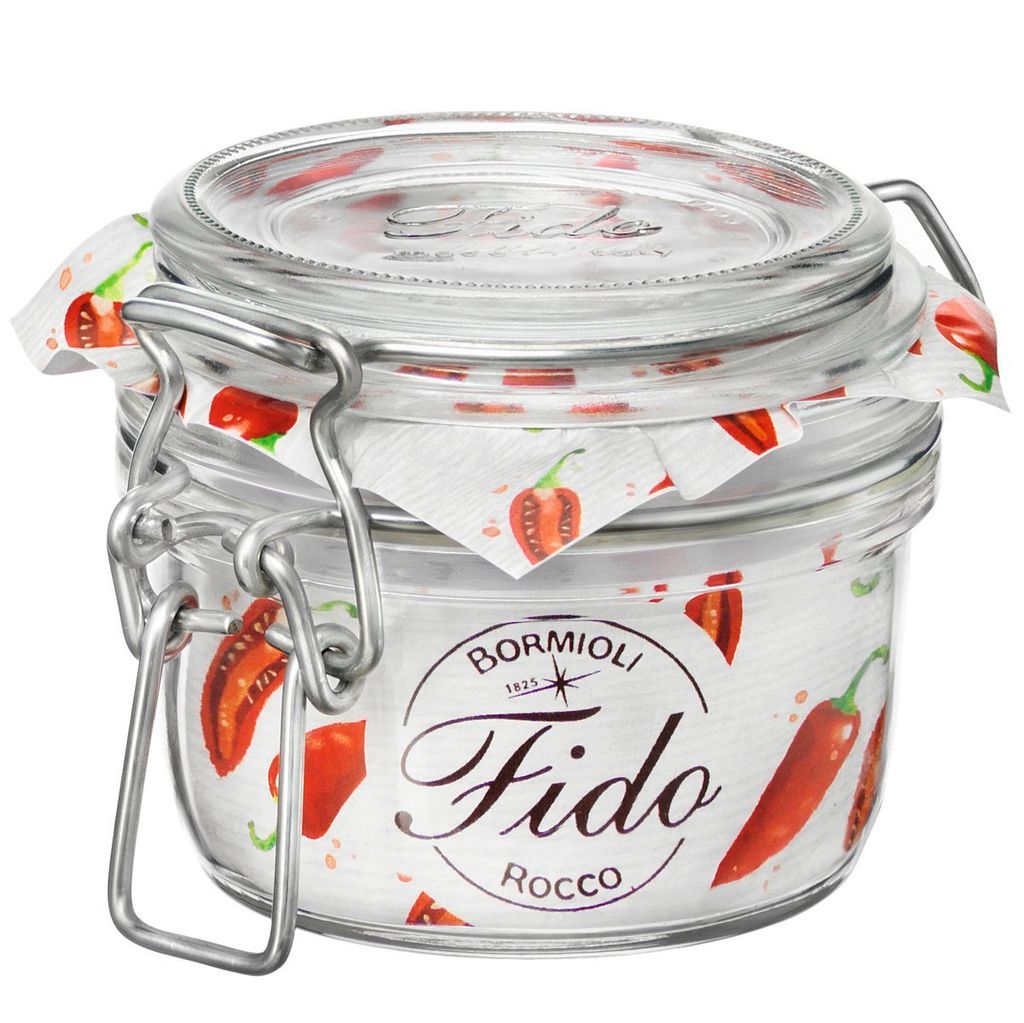 A clear studio shot of a Bormioli Fido Rocco jar with a chili pepper pattern.
