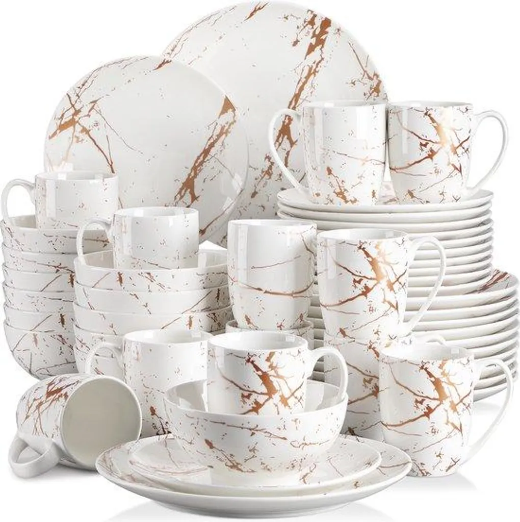 Service en porcelaine blanche et dorure or décoratif de 48 pièces