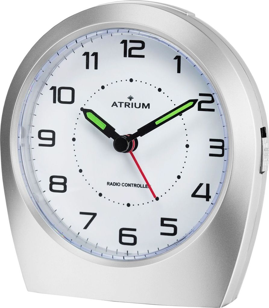 A close-up studio shot of a silver alarm clock with a white face.