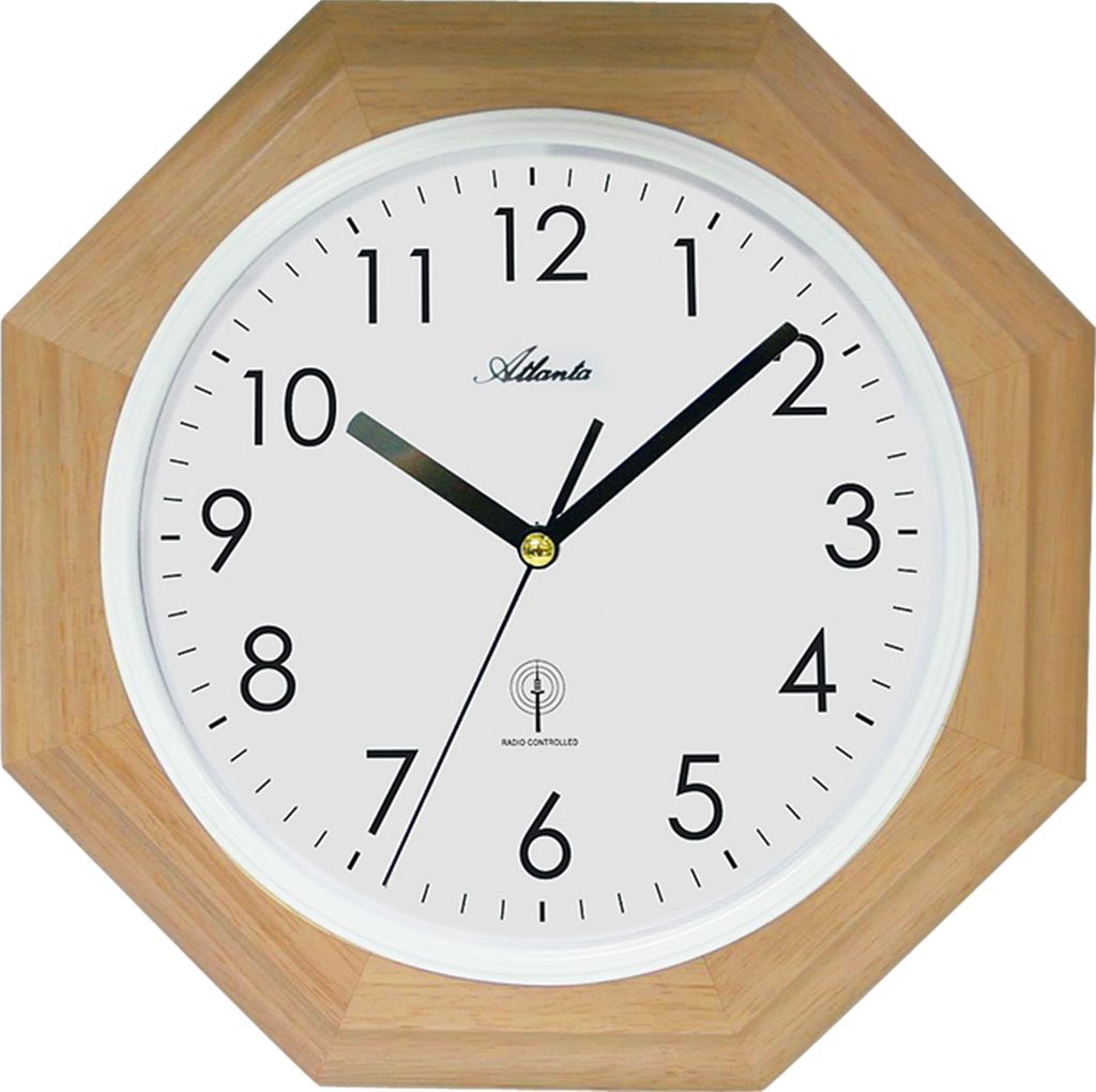 A close-up, front-facing view of an octagonal wall clock with a wooden frame and a white face.