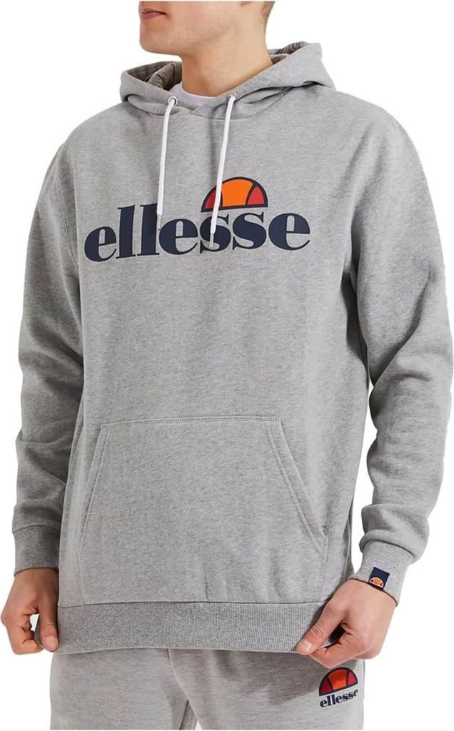 A man wearing a grey Ellesse hoodie.
