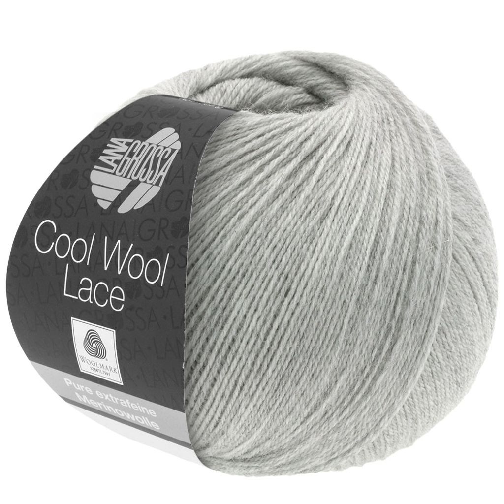 A ball of light gray yarn with a label.