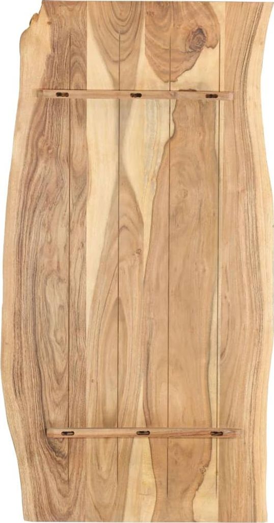 A close-up view of a wooden table top with a live edge.