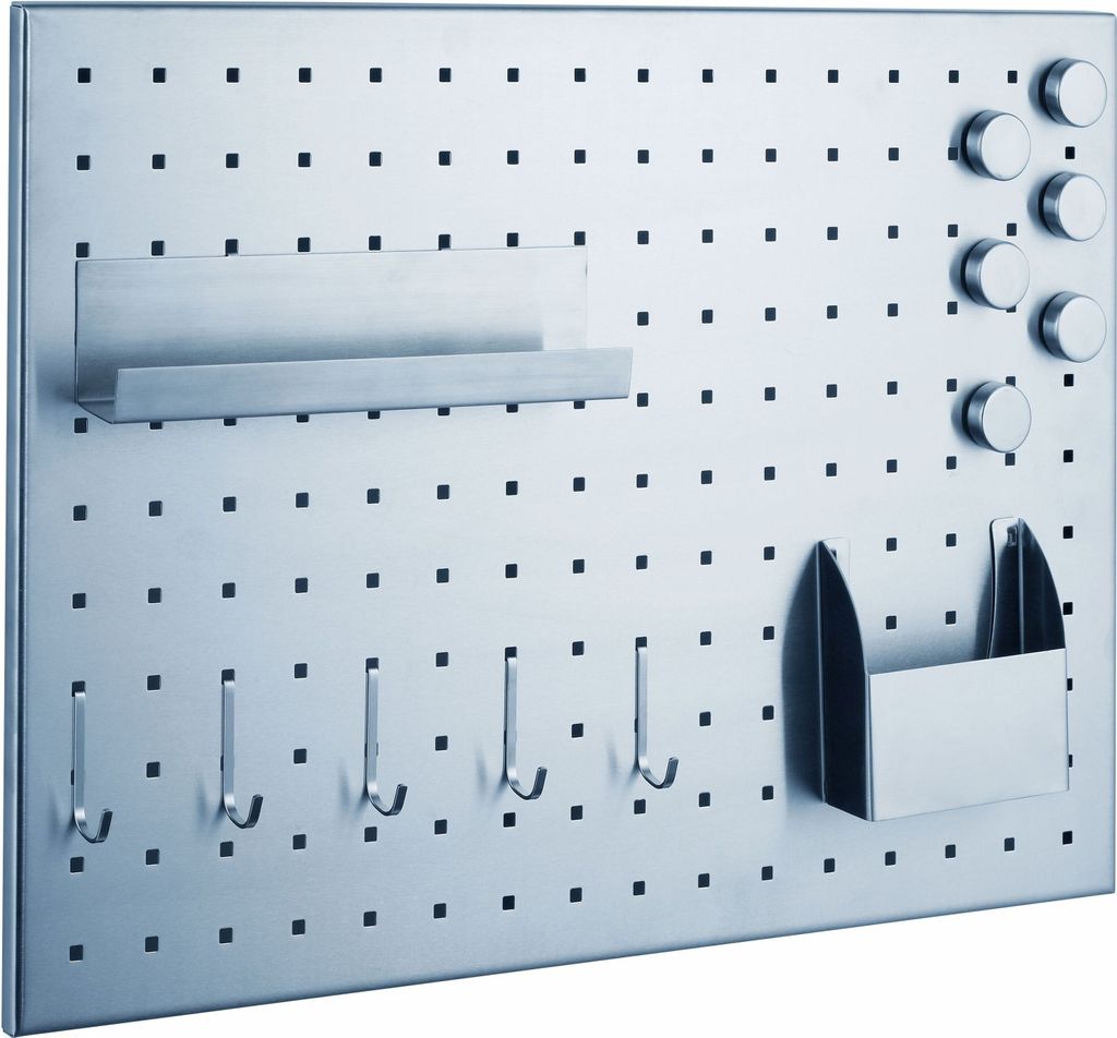 A pegboard with various accessories attached.