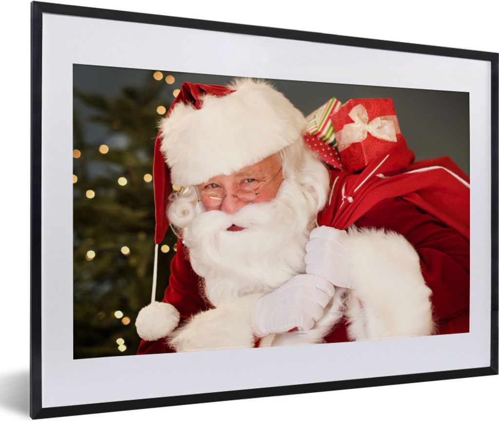 MuchoWow Gerahmtes Poster Ein Porträt des Weihnachtsmanns, der einen roten Sack über der Schulter trägt 60x40 cm - Poster mit Schwarzem Bilder...