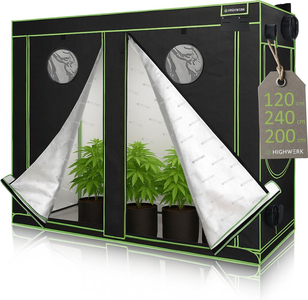 A grow tent with plants inside, displayed on a reflective surface.