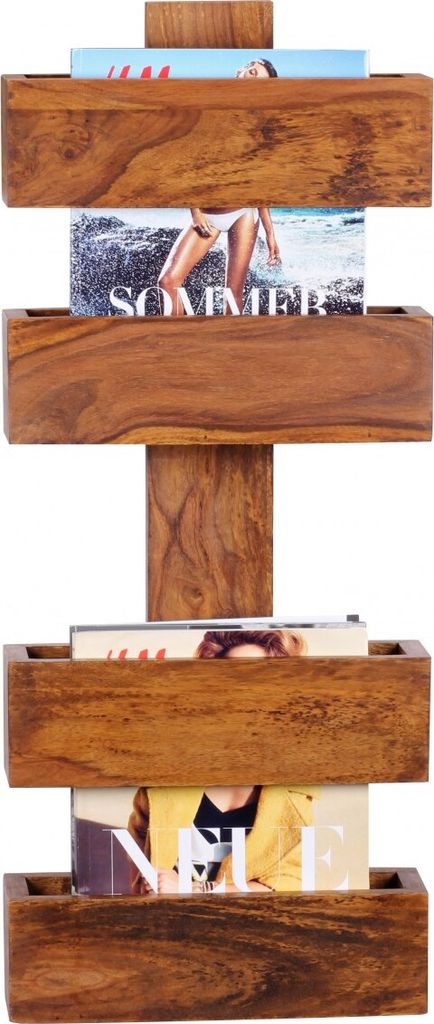 A wooden magazine rack with magazines in it, shown against a white background.
