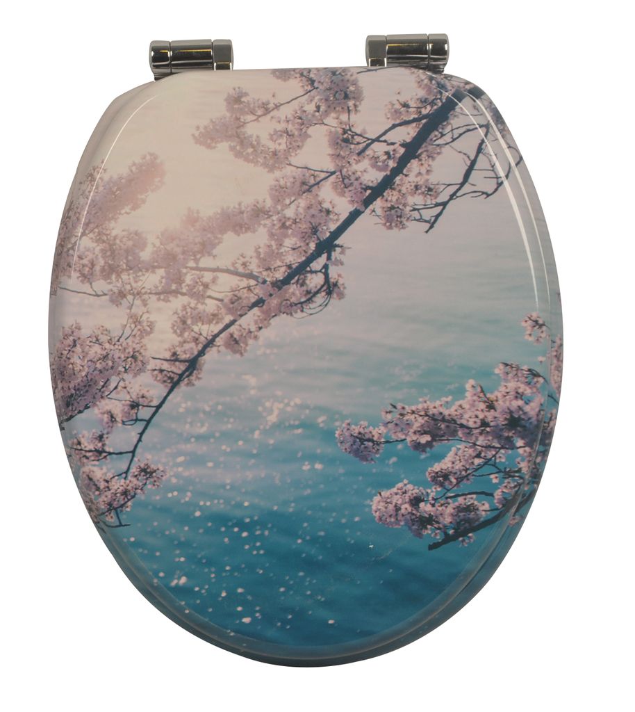 A toilet seat with a cherry blossom design.