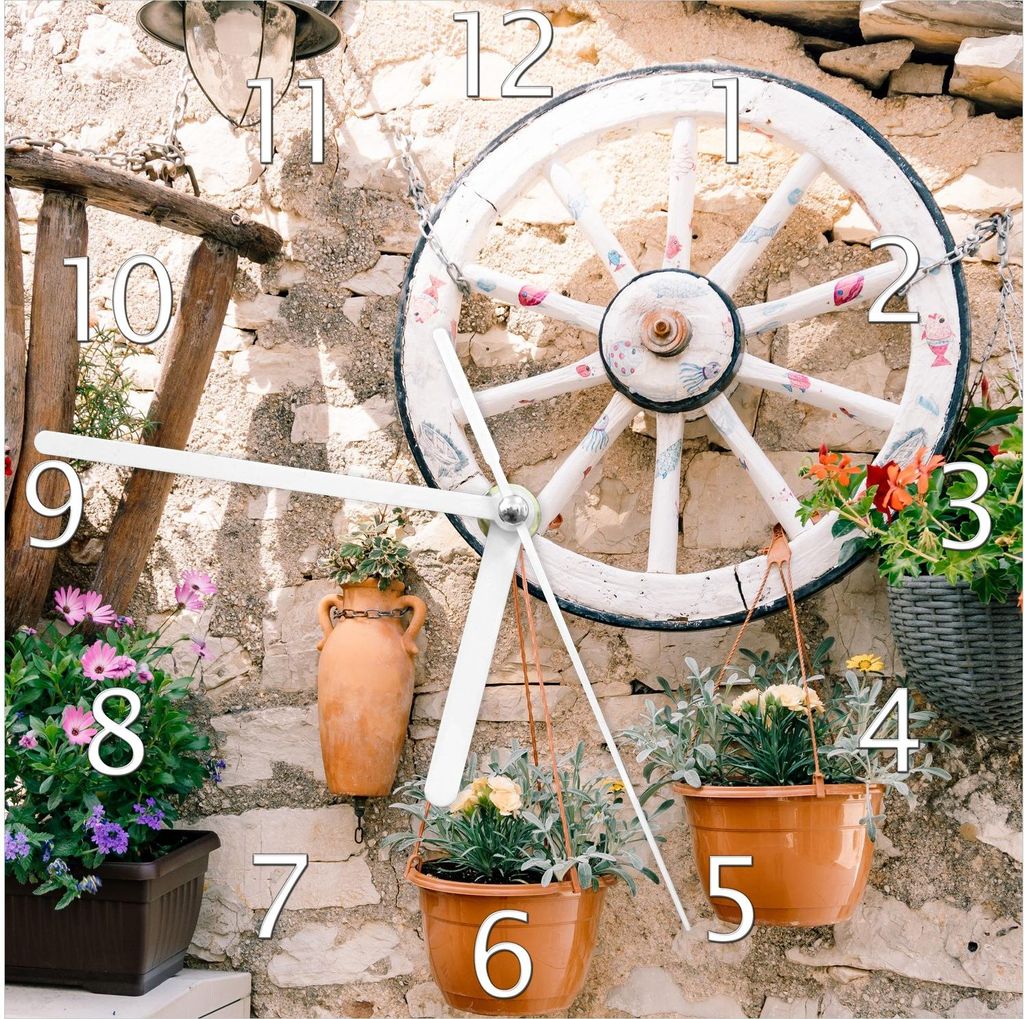 Wallario Design Wanduhr Wagenrad an Natursteinwand aus Echtglas, Größe 20 x 20 cm