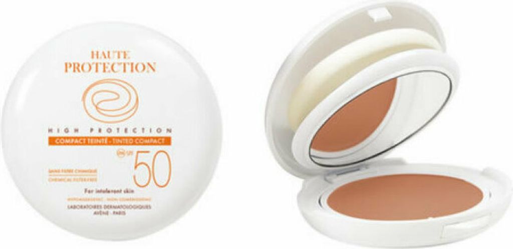 A compact sunscreen and its open case with a mirror and applicator.