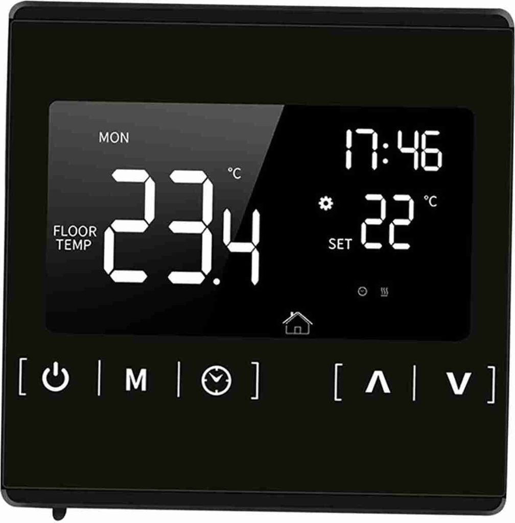 A close-up of a black digital thermostat with a bright LCD screen displaying temperature and time.