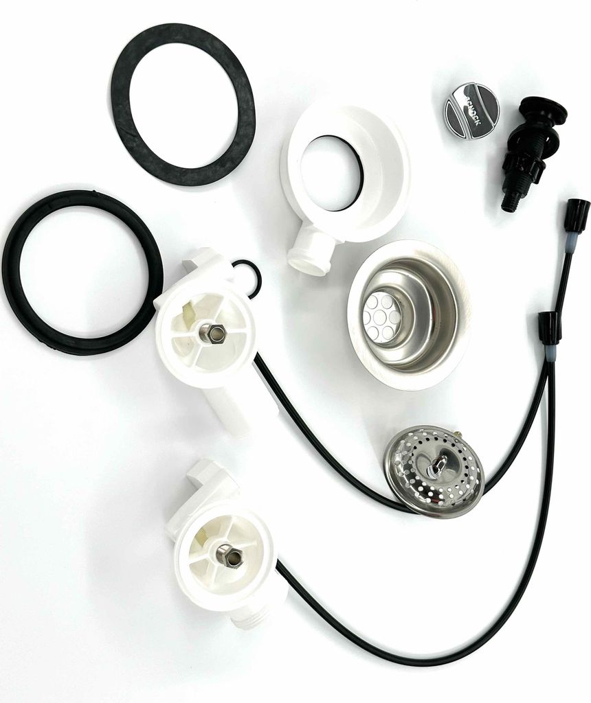 A collection of plumbing parts laid out on a white background.