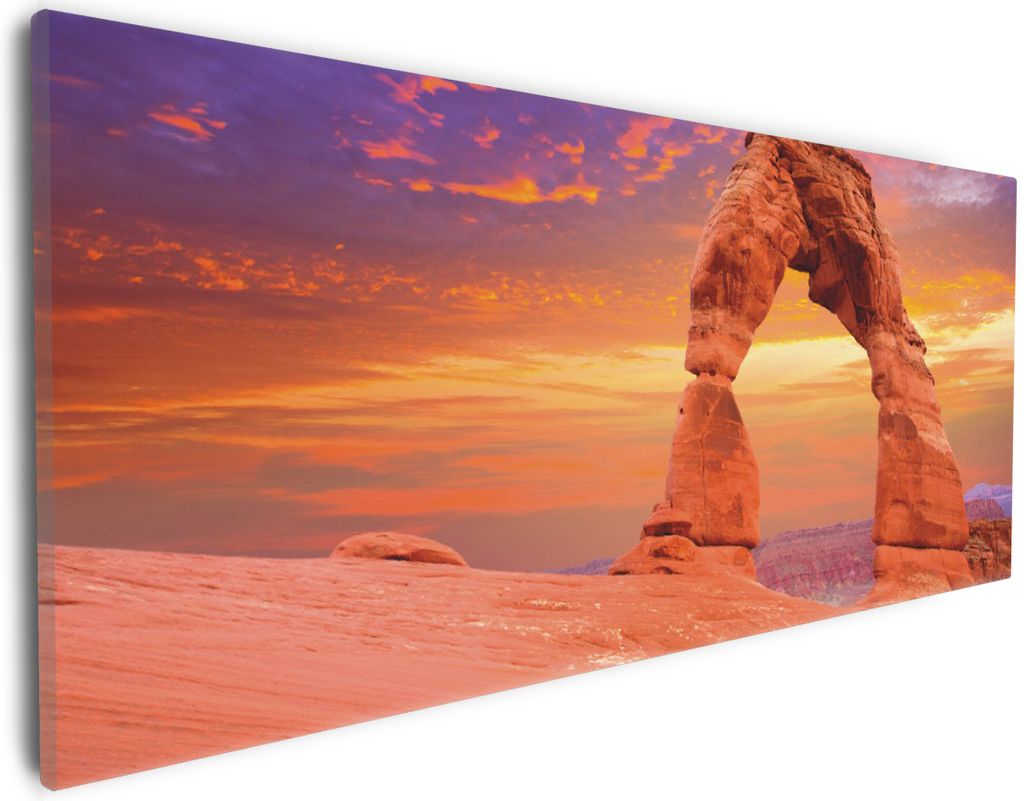 Wallario Premium Leinwandbild Steinbogen vor einem farbenfrohen Himmel in lila-rot in Größe 30 x 75 cm