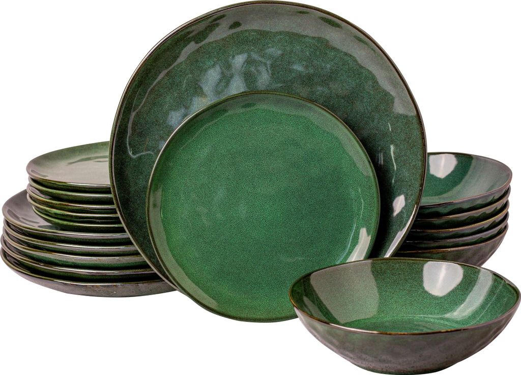 A stack of green ceramic plates and bowls on a white background.
