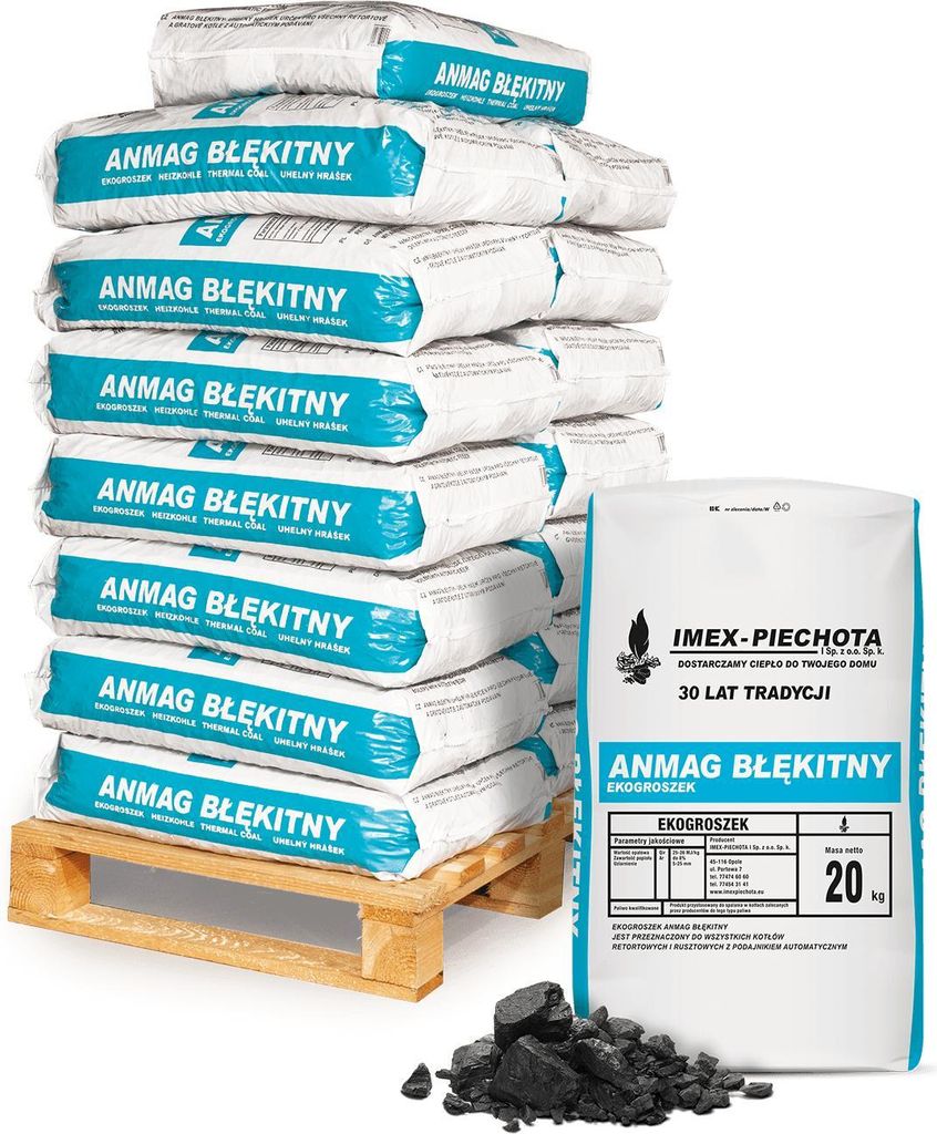 A stack of bagged coal on a pallet, with a single bag and some loose coal in the foreground.