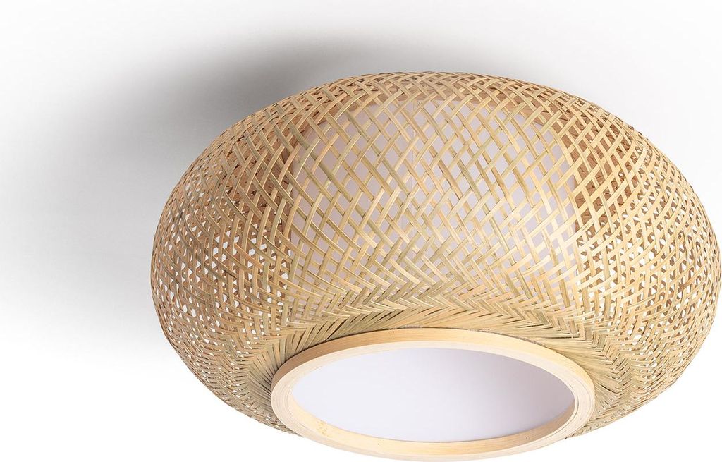 A close-up view of a round ceiling light made of woven bamboo with a white diffuser.