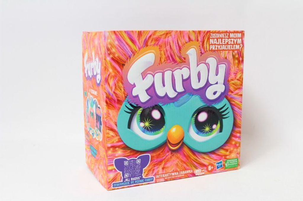 A product box for a Furby toy, featuring a colorful, fuzzy design and the Furby logo.