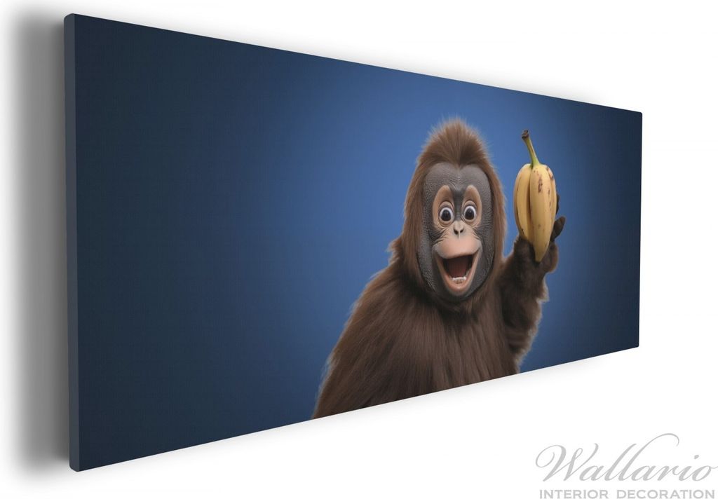 Wallario Premium Leinwandbild Lustiger Affe mit Bananen in Größe 30 x 75 cm