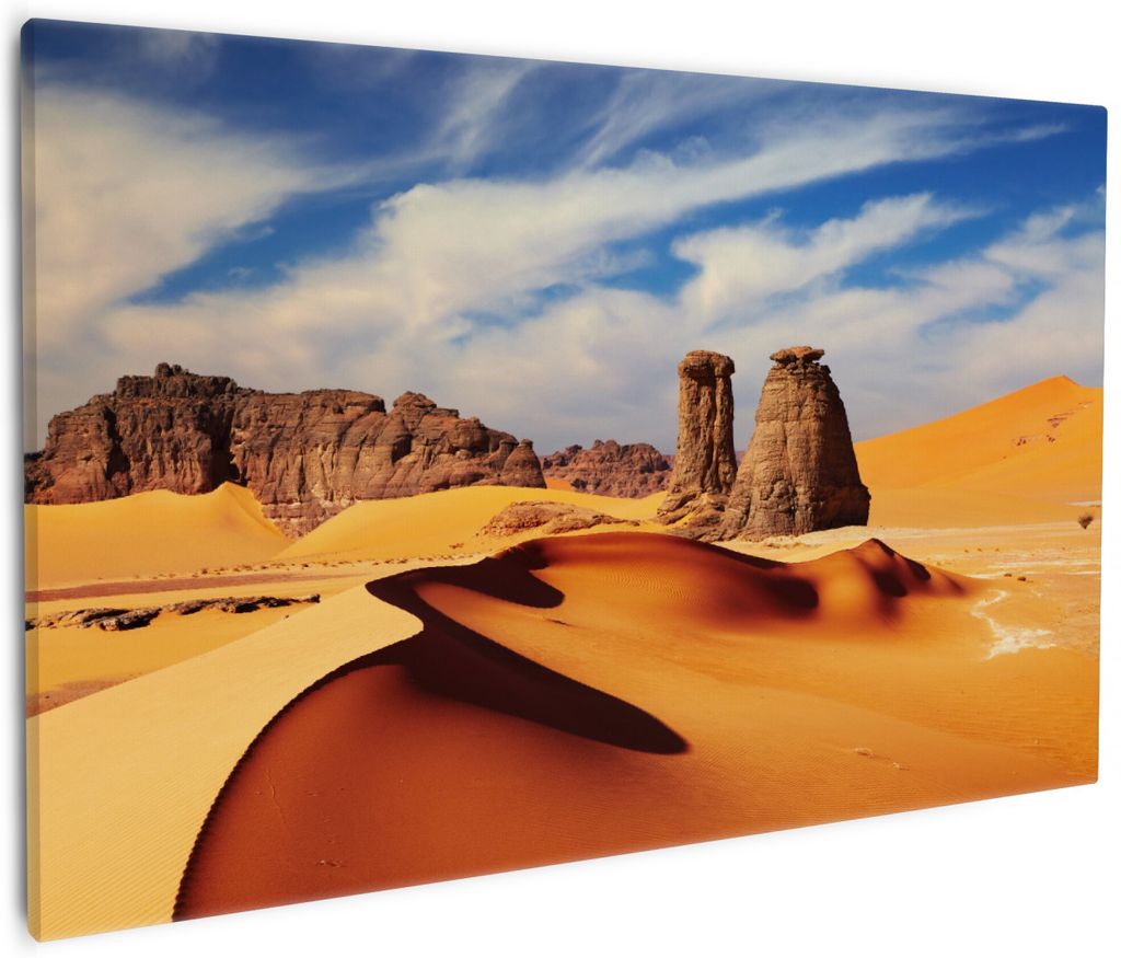 Wallario Premium Leinwandbild Felsen und Sand in der Sahara Wüste in Größe 60 x 90 cm