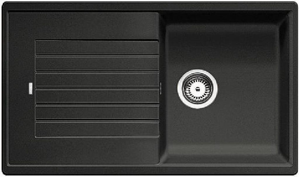 A top-down view of a black kitchen sink with a drainer.