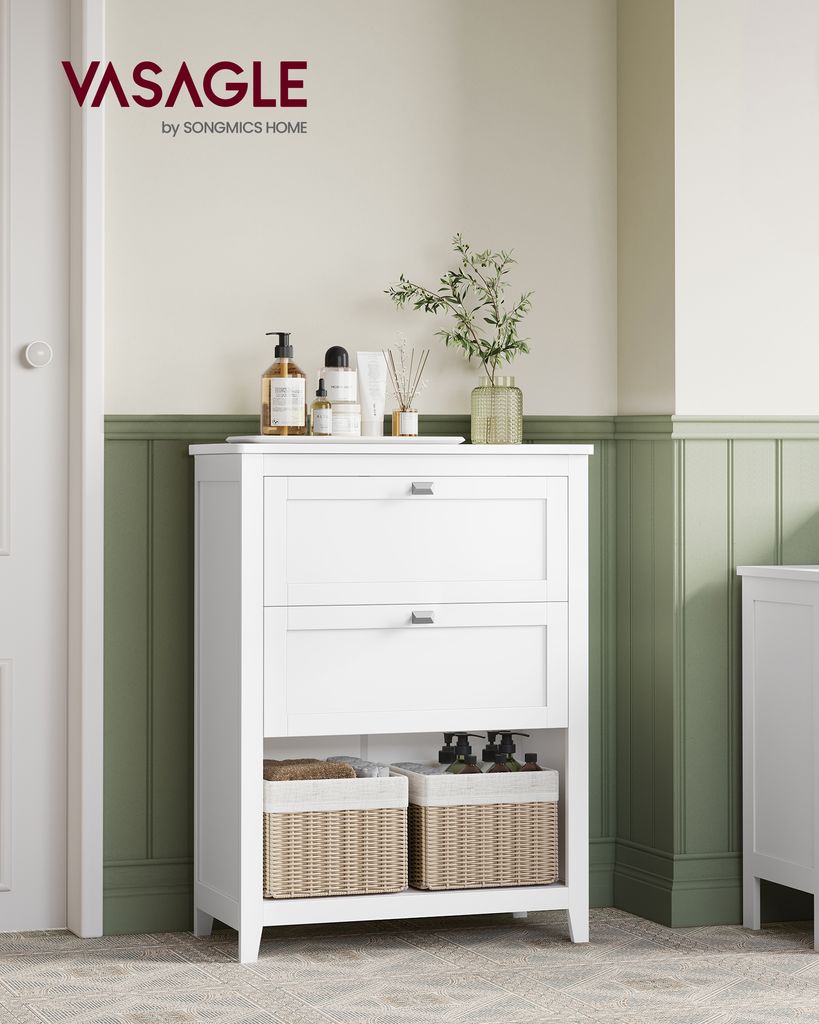 A white bathroom cabinet with two drawers and two baskets on the bottom shelf, placed in a room with green paneled walls.