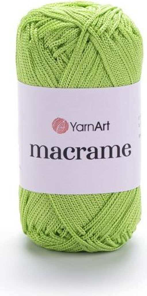 A roll of green macrame yarn on a white background.