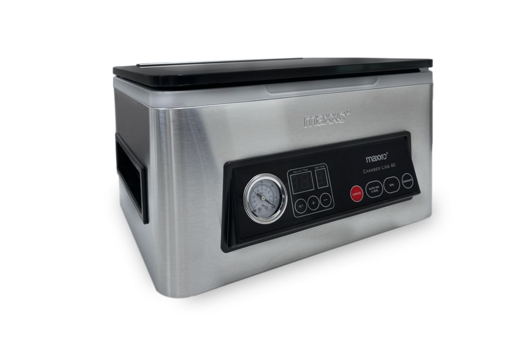 A stainless steel vacuum sealer with a black control panel and lid, shown from a three-quarter front angle against a white background.