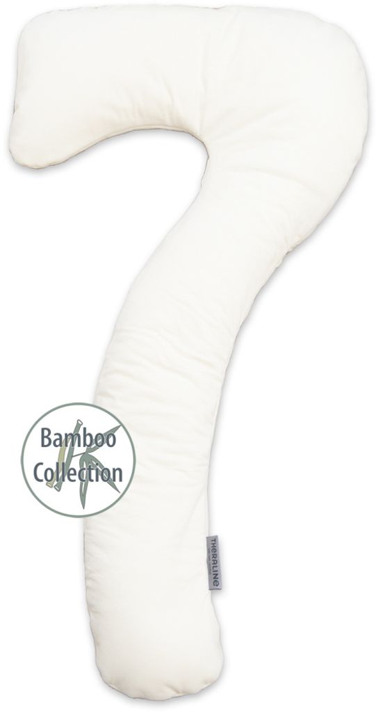 A white maternity pillow shaped like the number 7.