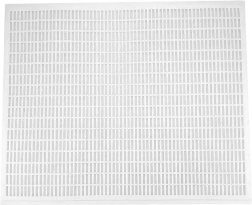 Bloquer la reine en bas de ruche 10 cadres avec cette grille en plastique