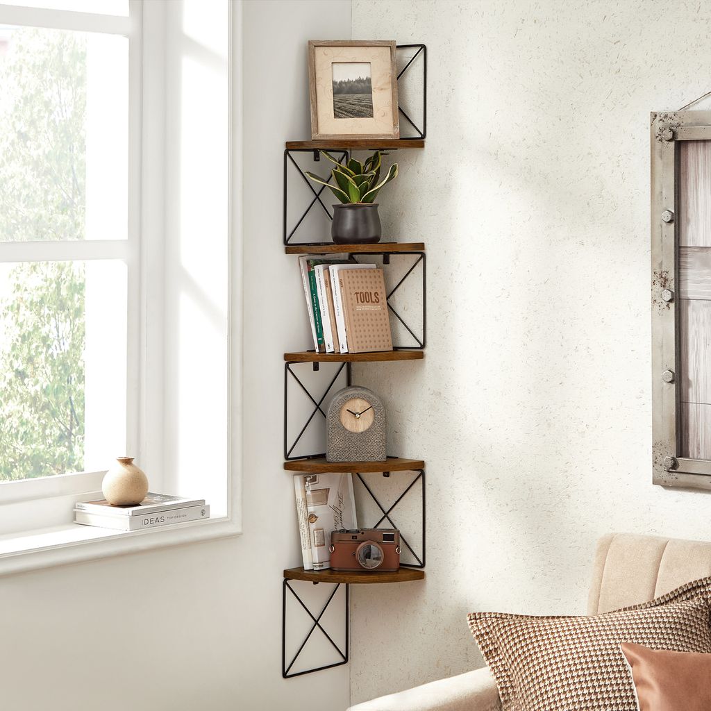 A corner shelf unit with decorative items next to a window.