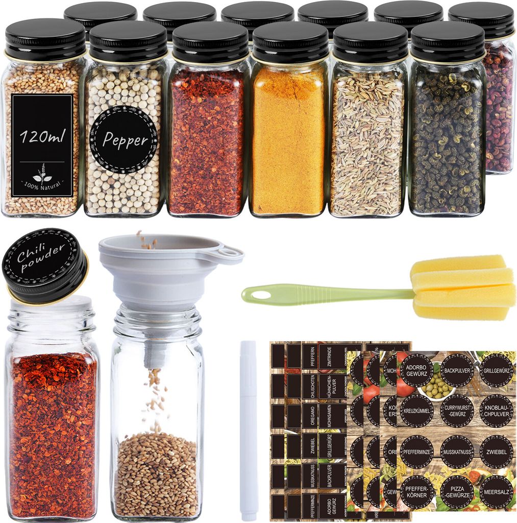 A collection of spice jars with various spices and accessories.