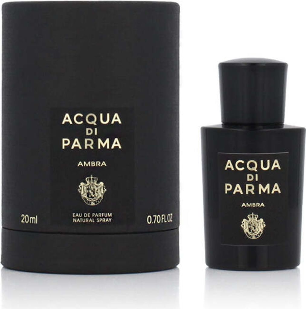 A black perfume bottle and its packaging are displayed against a white background.