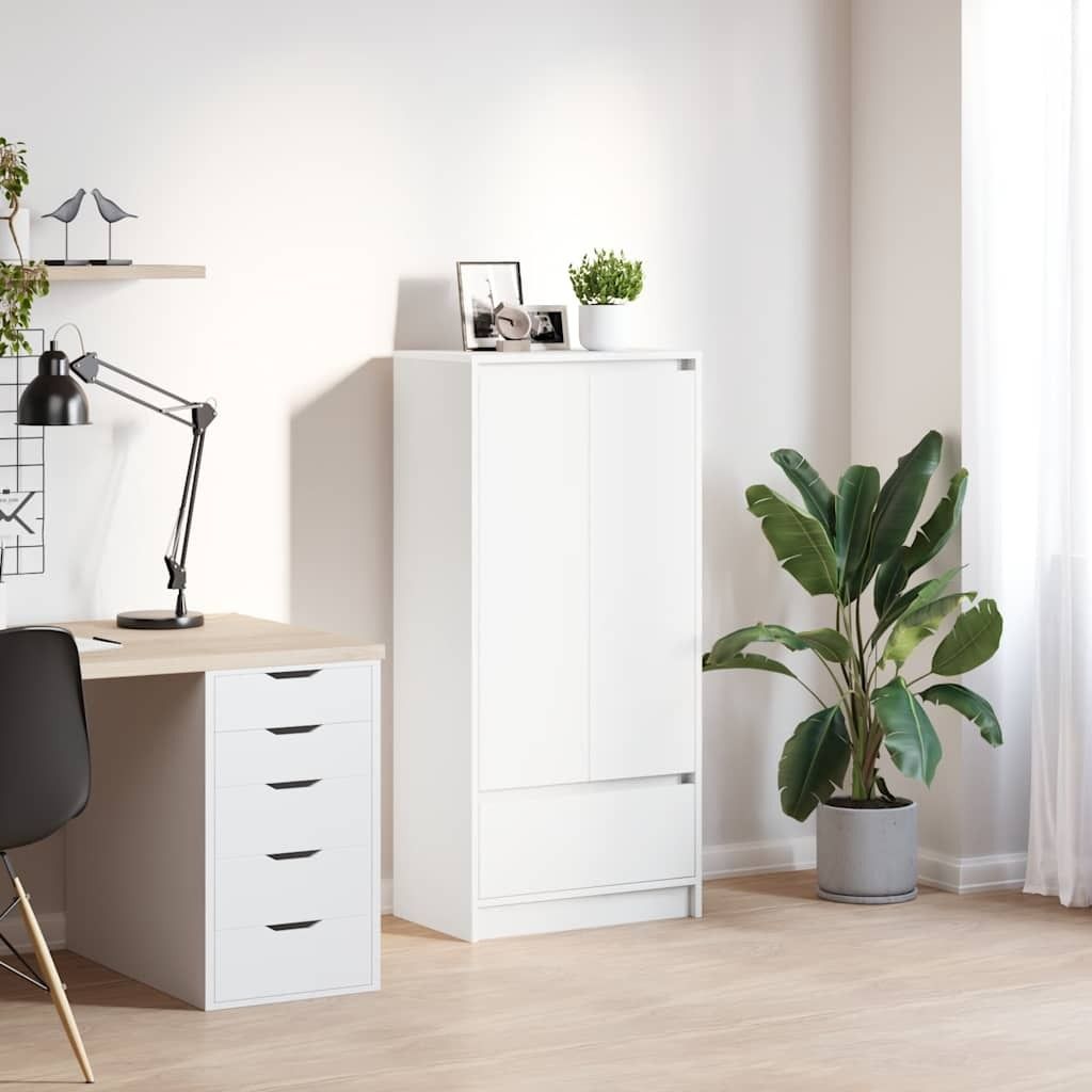 A minimalist home office setup with a desk and storage cabinet.