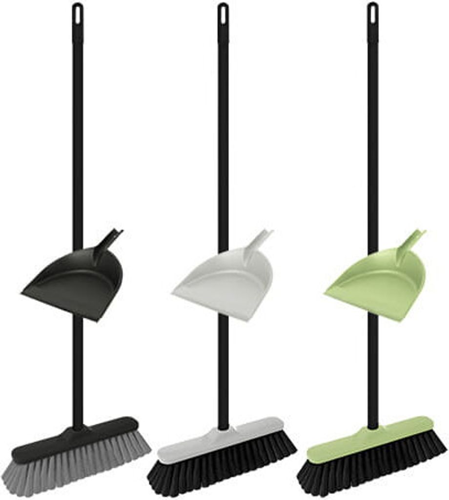 Three brooms with dustpans in different colors.