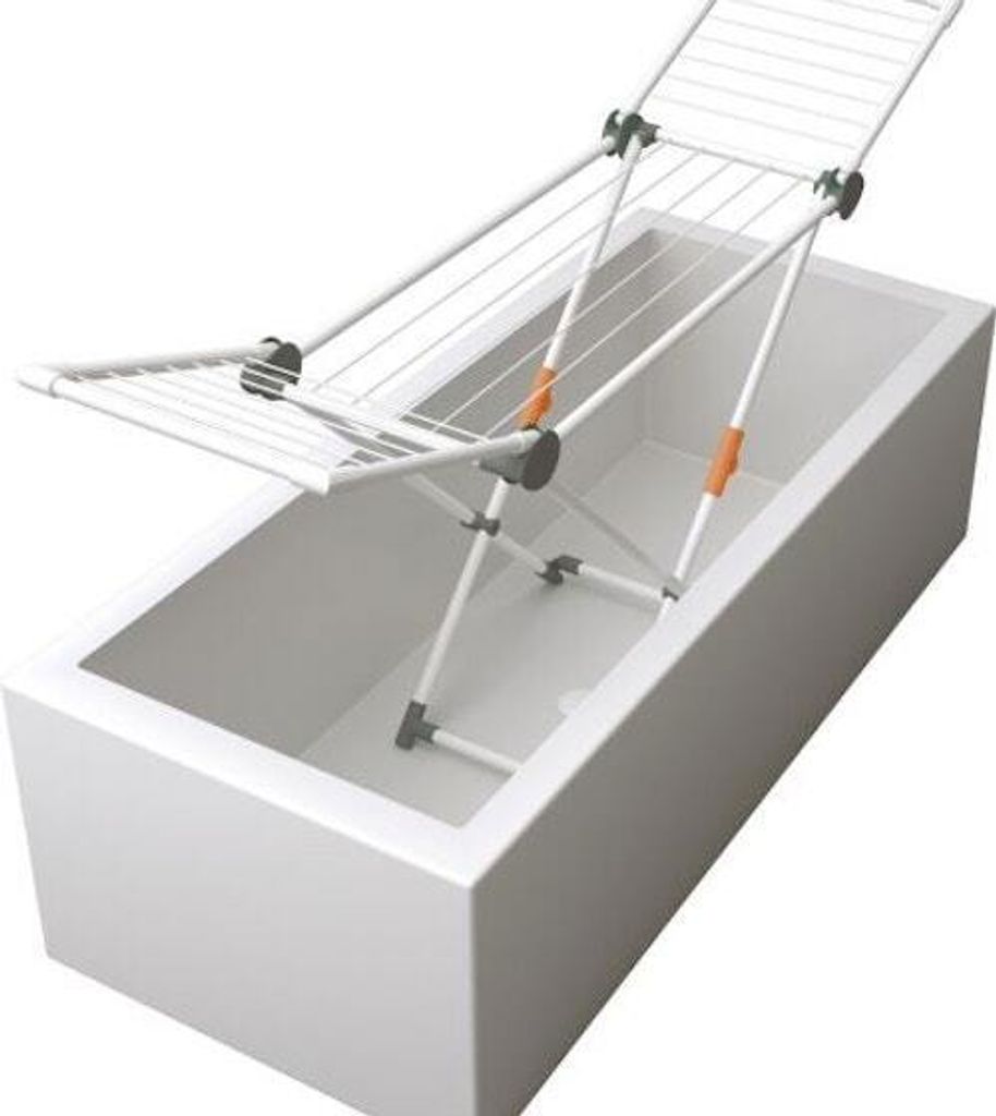 A white drying rack is placed inside a white bathtub.