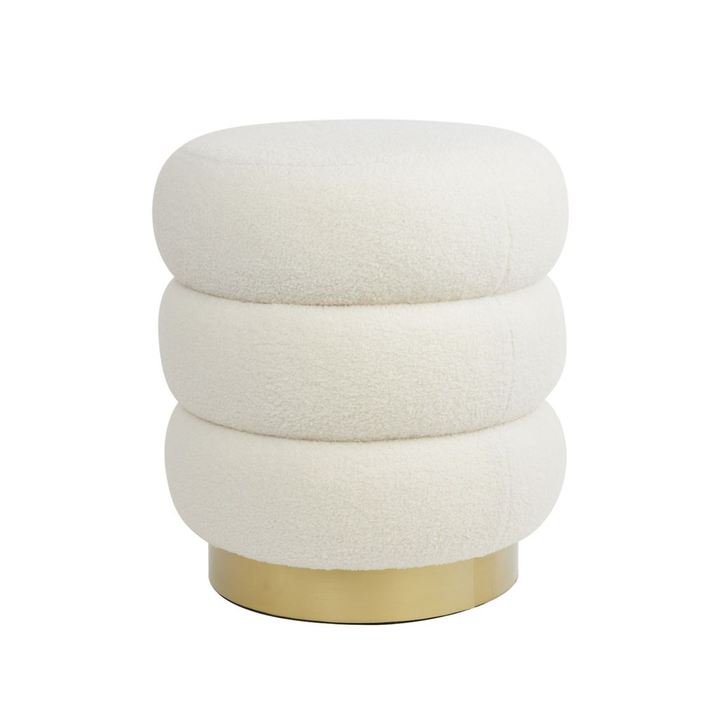 A white teddy fabric pouf with a gold base, presented on a white background.
