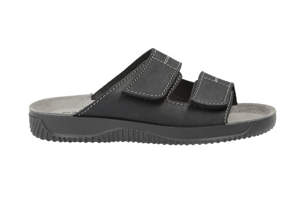 A black sandal on a white background.