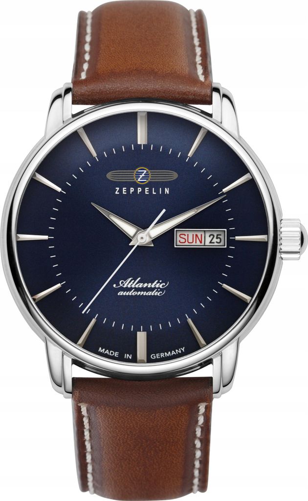 A close-up studio shot of a men's wristwatch with a blue dial and a brown leather strap.