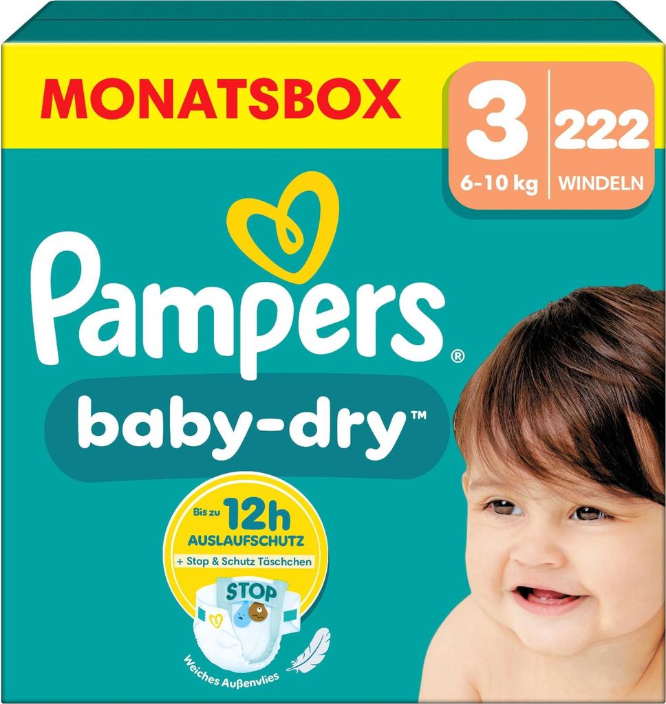 A box of Pampers baby-dry diapers with a baby's face visible on the right side.
