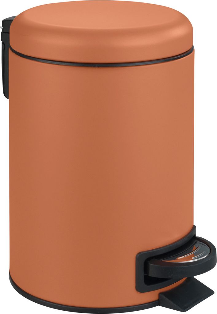 A terracotta colored pedal bin with a black pedal and rim.