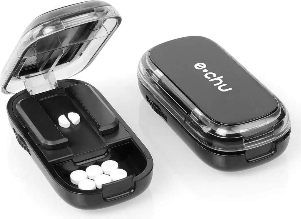 Coupe-pilules ergonomique noir avec rangement pour aide à la prise